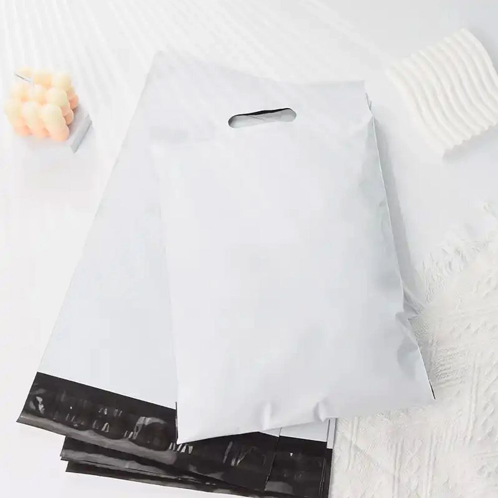 19e274c919bbef21a7d2539545cdf504 Courier foil bags with handle 400 x 500 mm + 70 mm handle RC091 50 pcs white