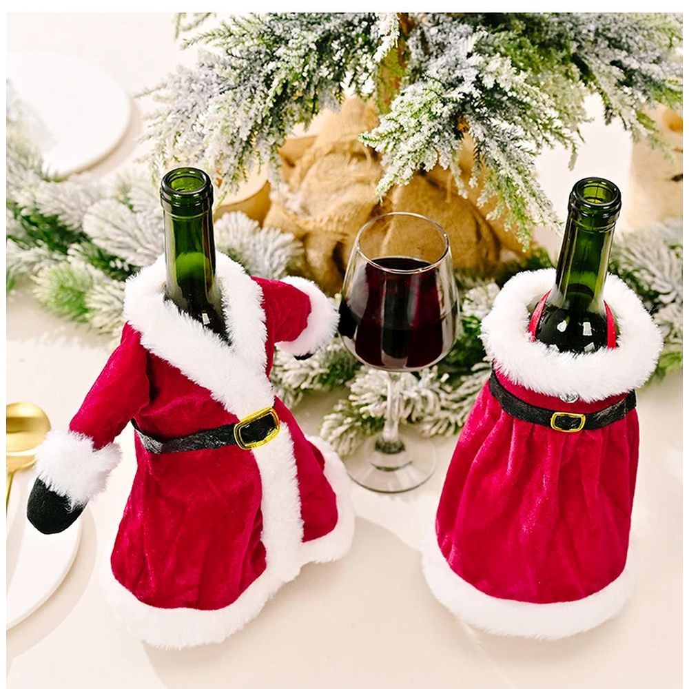 8c002570f702dd83c1503d2057f30f6a Christmas Bottle Cover "Christmas Dress" Pattern RC-K-301 Multicolor Bottle Decoration for the Holidays This charming bottle cover in the shape of a Christmas dress is a delightful way to decorate bottles during the Christmas season. Perfect for gifts, Christmas table decorations, or as a fun addition to bottles of drinks during holiday parties. Colorful, Festive Design The cover features a cheerful mix of red, green, and white, creating a joyful holiday atmosphere. It looks like a mini dress, giving the bottle a unique and decorative touch. Versatile Use Ideal for wine, champagne, juice, or any other bottles. A perfect way to transform an ordinary bottle into a festive holiday decoration. Great Gift Idea This bottle cover also makes a great gift idea – a decorated bottle becomes an original and special present for loved ones. ✅ Specifications: Model: RC-K-301 Pattern: Christmas dress Color: Multicolor (red, green, white) Use: Bottle decoration, gift, Christmas table ornament Material: Fabric ✨ Add a touch of holiday magic – beautiful bottle cover for your celebrations!