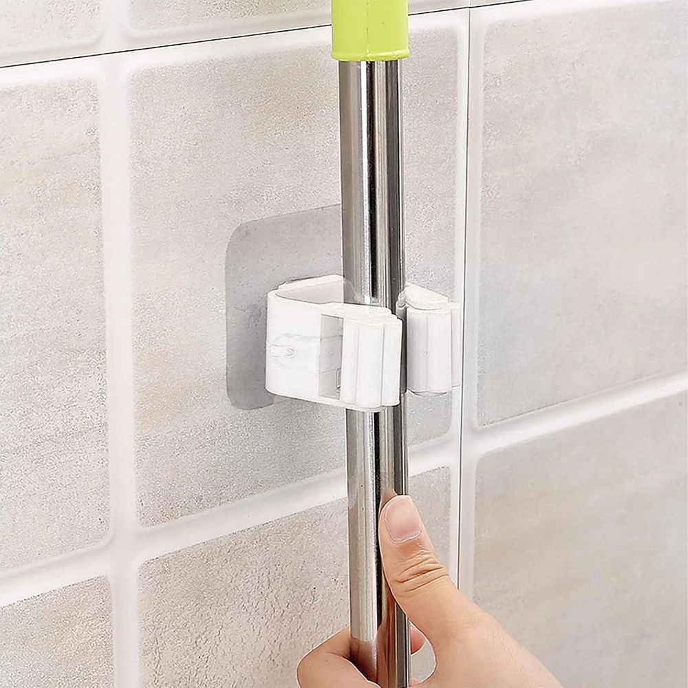 9505c6b682e3713a62296e4b1ac4d210 Wall-mounted broom mop holder self-adhesive RC-K-1153 white