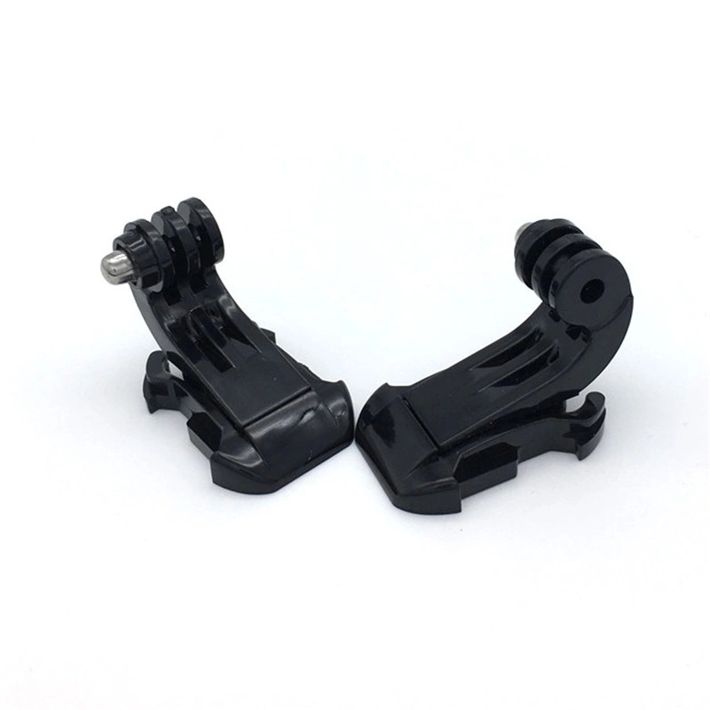 Adjustable harness for a sports camera with a rotating tripod and a phone standeng