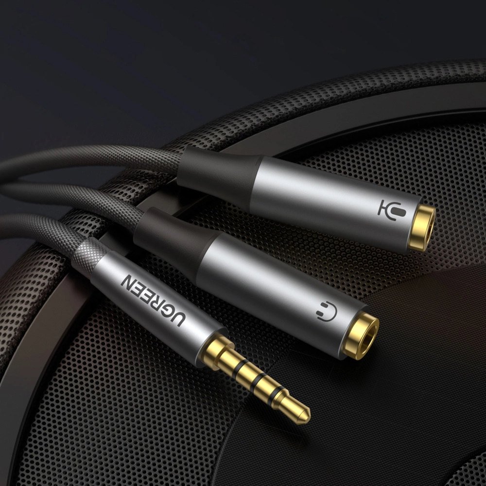 Ugreen AUX splitter for headphones and microphone 1 x male 3.5mm, 2 x female 3.5mm 20cm black (AV192 50254)eng