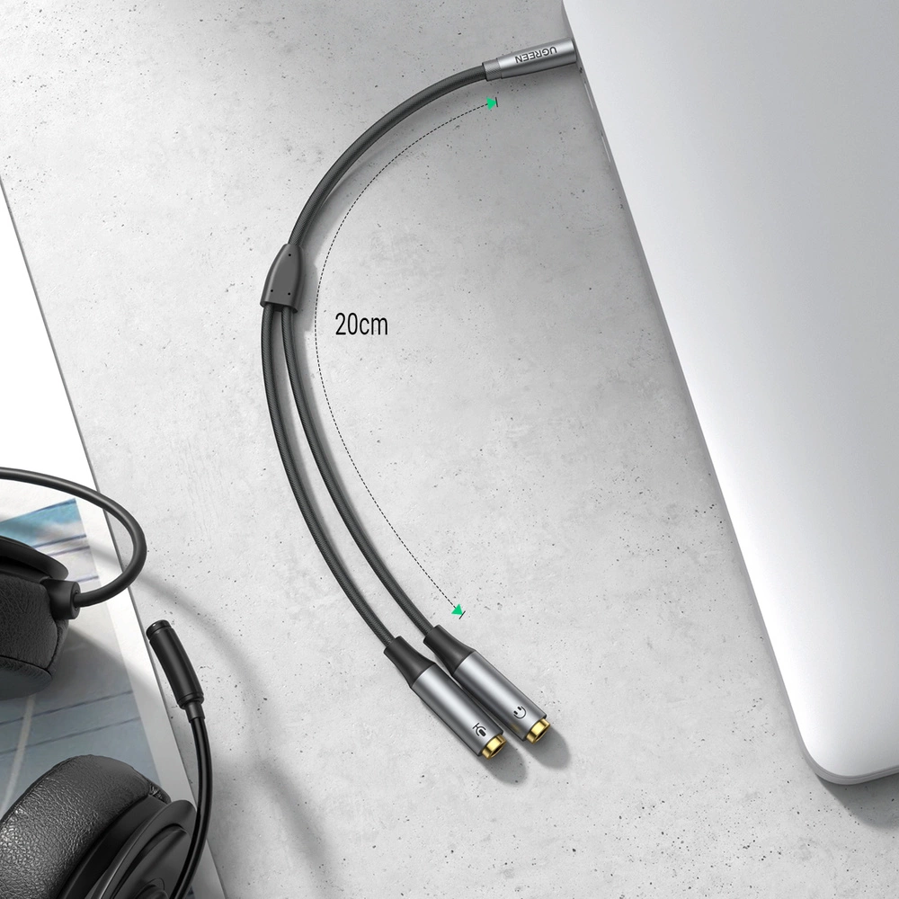 Ugreen AUX splitter for headphones and microphone 1 x male 3.5mm, 2 x female 3.5mm 20cm black (AV192 50254)eng