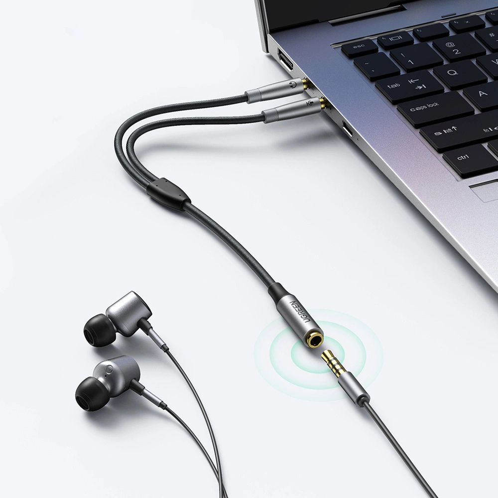 Ugreen AUX splitter cable 3.5 mm mini jack (female) - 2x 3.5 mm mini jack (male - microphone and headphones) silver (AV193 50255)eng