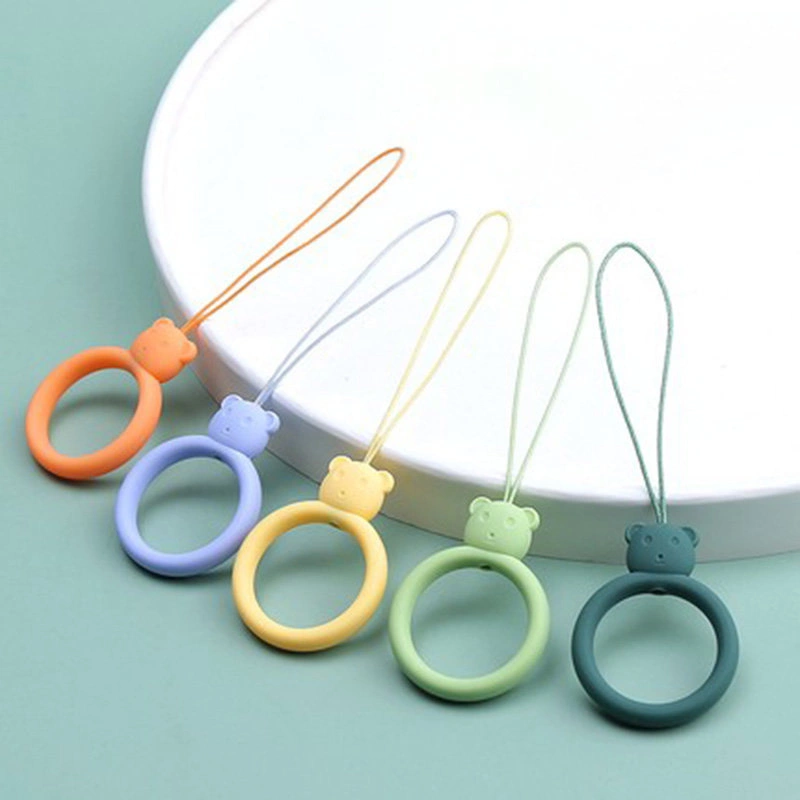 A silicone lanyard for a phone bear ring on a finger orangeeng