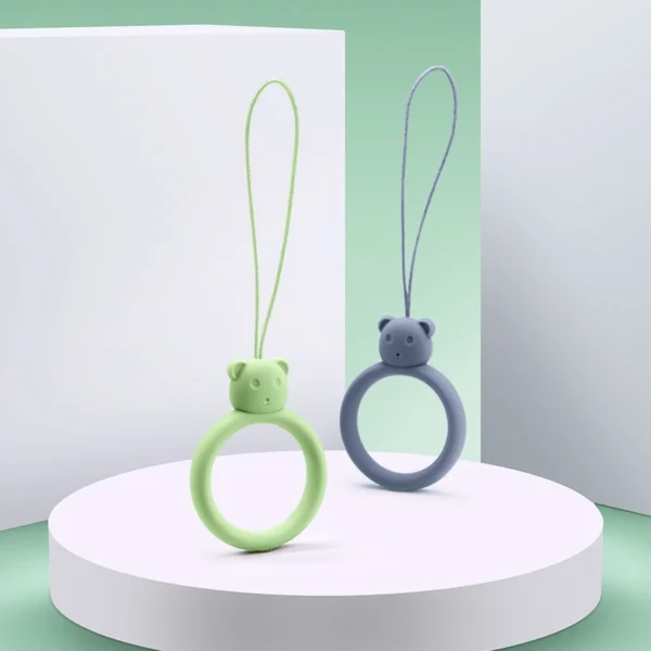 A silicone lanyard for a phone bear ring on a finger orangeeng