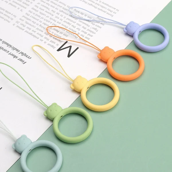 A silicone lanyard for a phone bear ring on a finger orangeeng