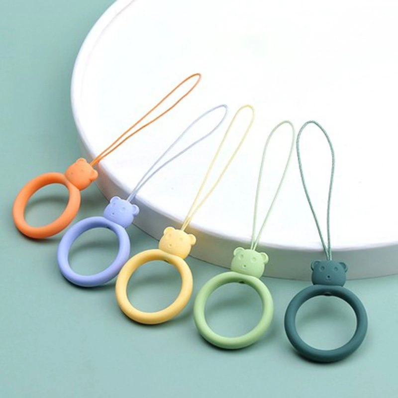 A silicone lanyard for a phone bear ring on a finger light greeneng