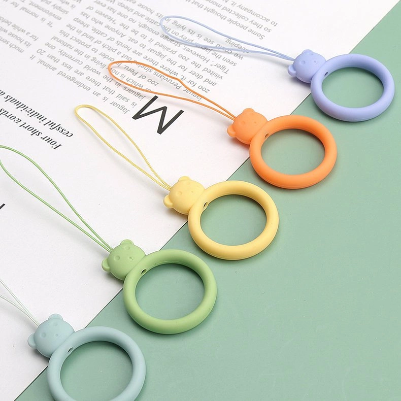 A silicone lanyard for a phone bear ring on a finger light greeneng