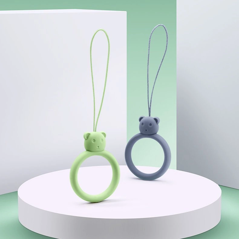 A silicone lanyard for a phone bear ring on a finger yelloweng