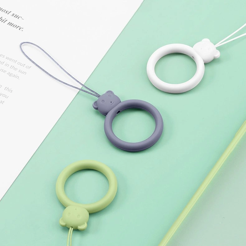A silicone lanyard for a phone bear ring on a finger yelloweng